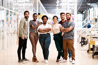 Buy stock photo Portrait of a group of young creatives standing together in an office