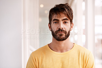 Buy stock photo Cropped portrait of a handsome young male designer standing in his office