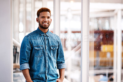 Buy stock photo Cropped portrait of a handsome young male designer standing in his office