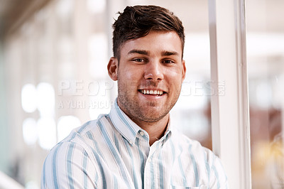 Buy stock photo Cropped portrait of a handsome young male designer standing in his office