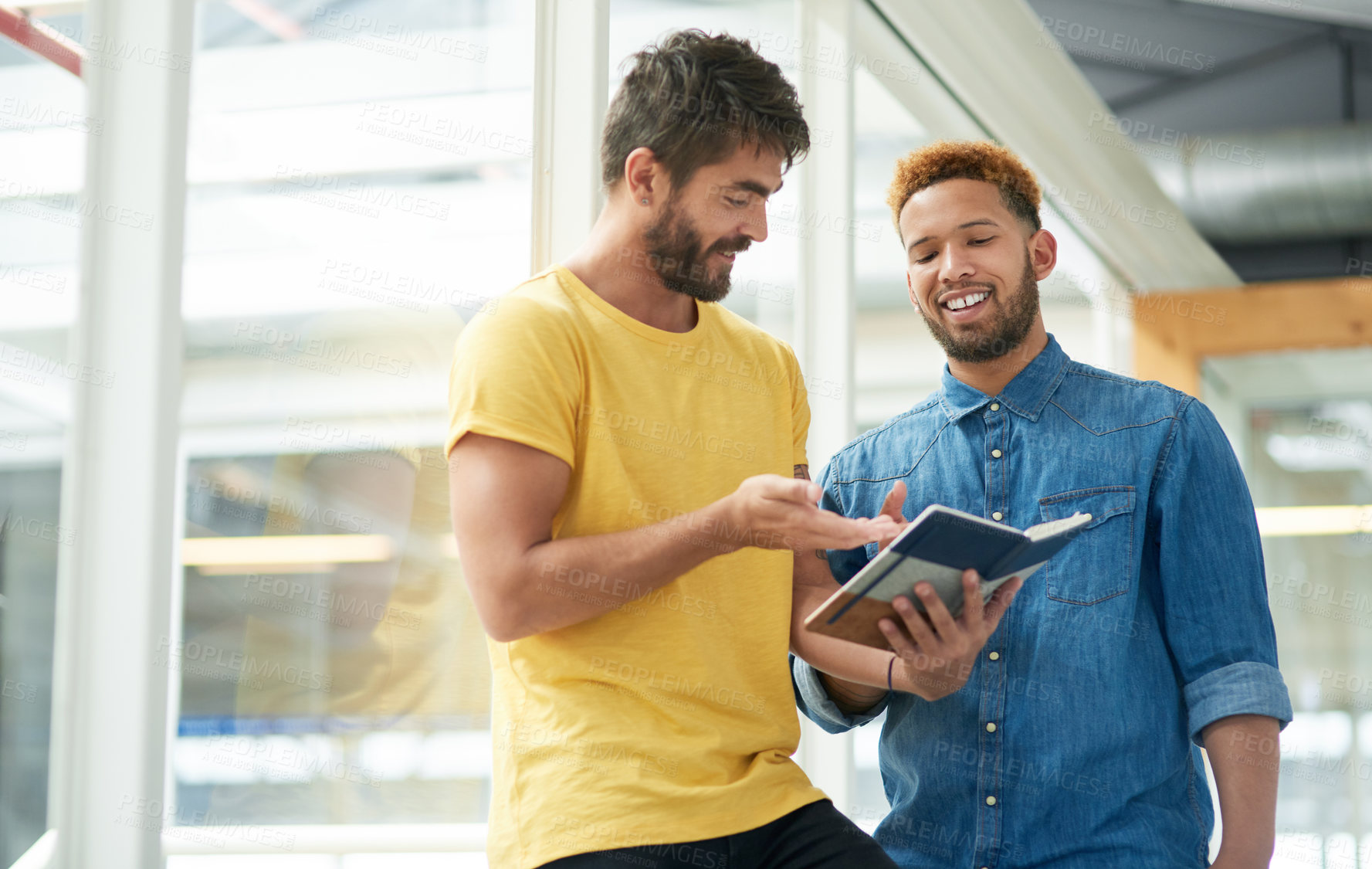 Buy stock photo Creative, discussion and men in office with notes, collaboration and business plan schedule. Advice, notebook and design team checking project ideas for startup development, partnership and questions