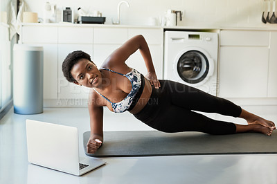 Buy stock photo Woman, laptop and side plank in home for strong core, balance and power with abs in morning. African person, girl and workout for flat stomach, obliques and online course for fitness at apartment