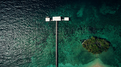 Buy stock photo High angle shot of a pier along the island coasts of Indonesia