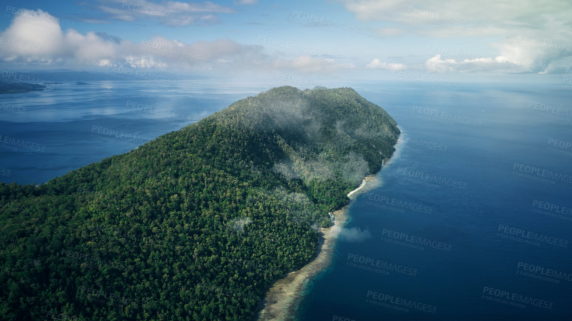 Buy stock photo Drone, ocean or island and forest or trees for summer adventure, travel location or holiday destination. Aerial view, beach or natural environment with cloudy landscape or sea background in Indonesia