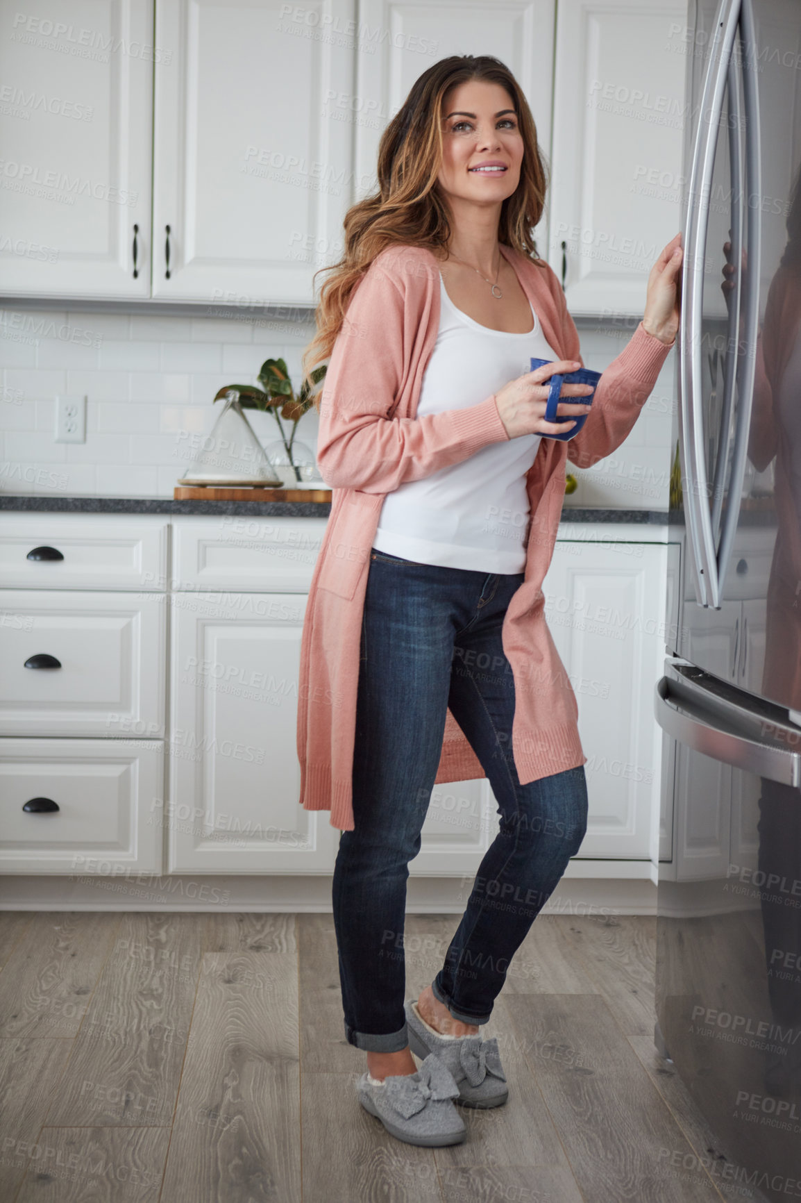 Buy stock photo Happy woman, thinking and fridge with coffee in kitchen for beverage, relax or start day in home. Female person, rest or smile with cup, mug or caffeine for comfort, holiday or weekend break in house