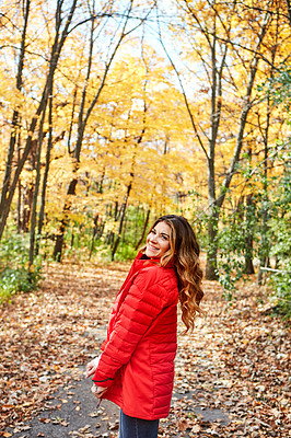 Buy stock photo Cropped portrait of an attractive young woman in the forest during autumn