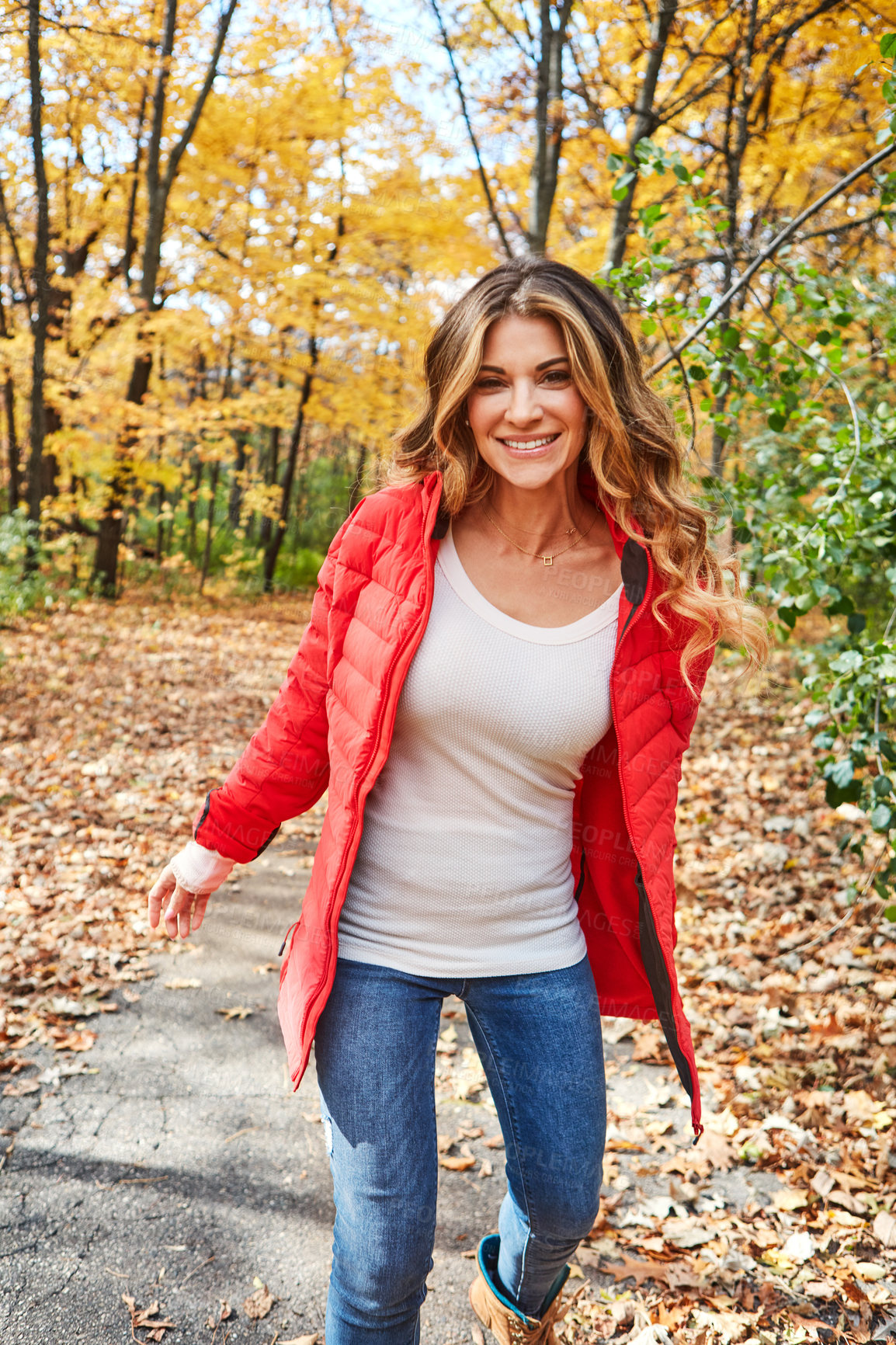 Buy stock photo Cropped portrait of an attractive young woman in the forest during autumn