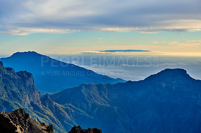 Buy stock photo The beautiful island of La Palma, Canary Islands in Spain in summer. Landscape copy space view of mountains and hills for hiking and adventure abroad. Scenic natural environment against a blue sky