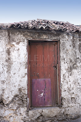 Buy stock photo Frontal view of traditional building in Santa Cruz de La Palma. Close up of ancient declining hut on Spanish island. Wooden door remains in am old cottage in a remote uninhabited area. 