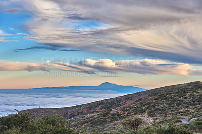 Buy stock photo Tenerife is the largest of Spainâs Canary Islands, off West Africa. It's dominated by Mt. Teide, a dormant volcano that is Spain's tallest peak. Tenerife may be best known for its Carnaval de Santa Cruz, a huge pre-Lent festival with parades, music, dancing and colorful costumes. The island has many beaches (with sands from yellow to black) and resort areas, including Los Cristianos and Playa de las AmÃ©ricas.