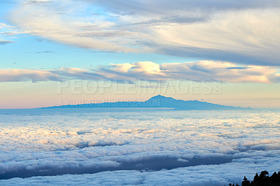 Buy stock photo Tenerife is the largest of Spainâs Canary Islands, off West Africa. It's dominated by Mt. Teide, a dormant volcano that is Spain's tallest peak. Tenerife may be best known for its Carnaval de Santa Cruz, a huge pre-Lent festival with parades, music, dancing and colorful costumes. The island has many beaches (with sands from yellow to black) and resort areas, including Los Cristianos and Playa de las AmÃ©ricas.