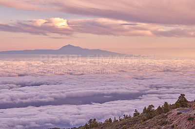 Buy stock photo Tenerife is the largest of Spainâs Canary Islands, off West Africa. It's dominated by Mt. Teide, a dormant volcano that is Spain's tallest peak. Tenerife may be best known for its Carnaval de Santa Cruz, a huge pre-Lent festival with parades, music, dancing and colorful costumes. The island has many beaches (with sands from yellow to black) and resort areas, including Los Cristianos and Playa de las AmÃ©ricas.