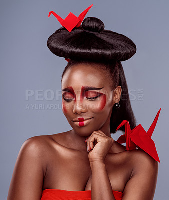 Buy stock photo Traditional, makeup and origami with black woman on gray background for creative, cosmetics and asian aesthetic. Beauty, paper design and female model for glamour, art and confidence in studio