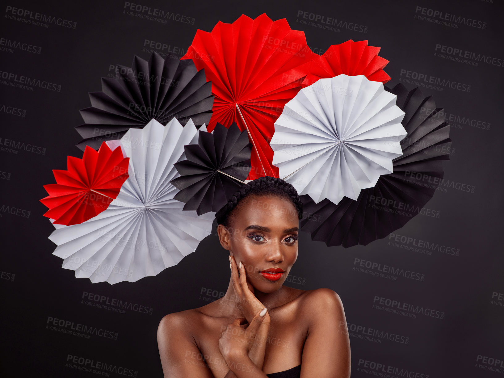 Buy stock photo Beauty, portrait and black woman with origami fans in studio isolated on a dark background. Serious face, makeup cosmetics and skincare of female model with traditional Japanese paper art for culture