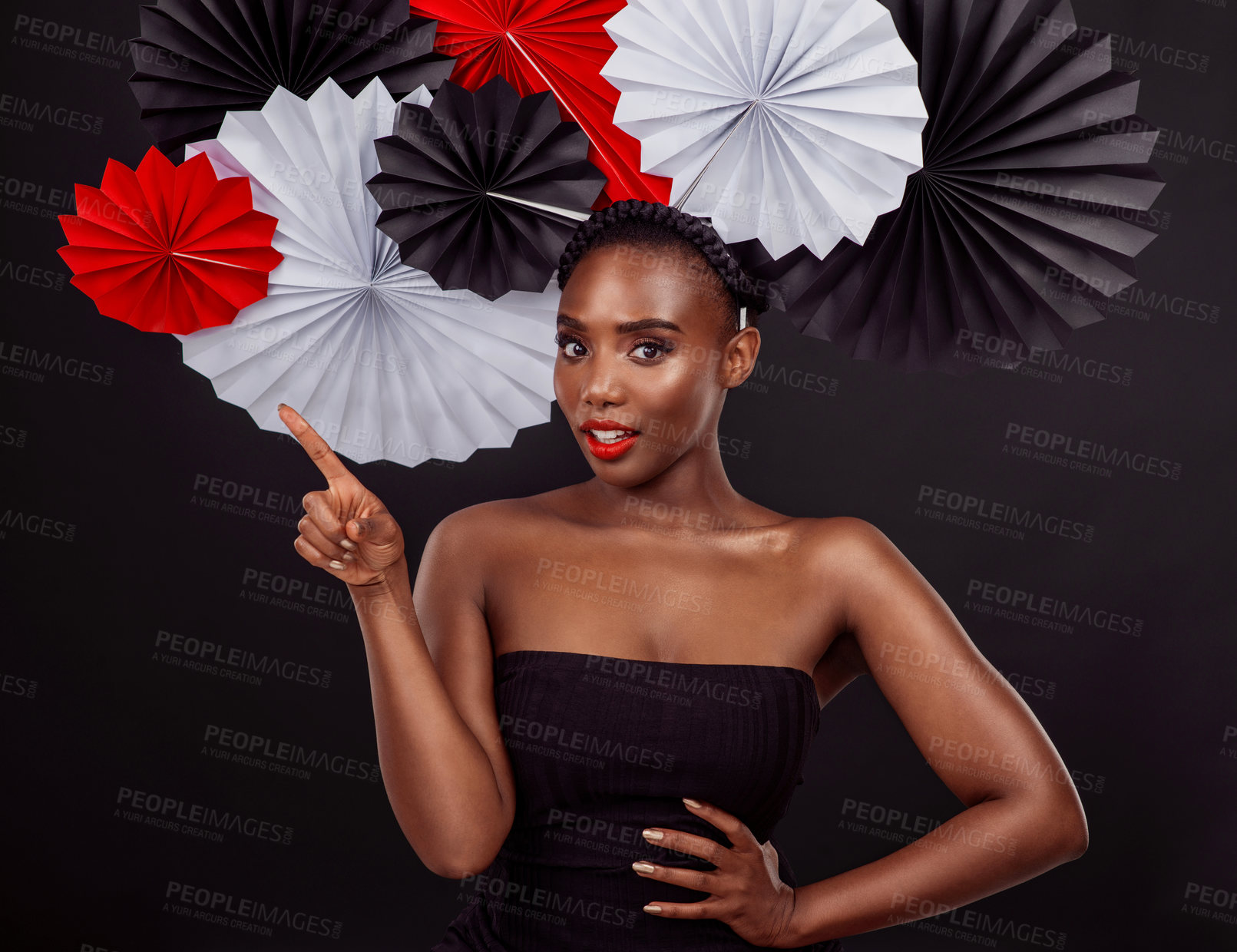 Buy stock photo Portrait, African woman and origami on hair in studio background for fashion with pointing, art and decor. Female person, artist and glamour for creativity, beauty or design with pride or confidence
