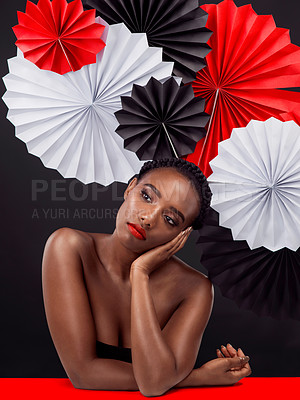 Buy stock photo Black woman, beauty and origami fashion for Japanese culture, creative and thinking of cosmetics in studio. Model with color fan, makeup and inspiration or idea for oriental design on dark background