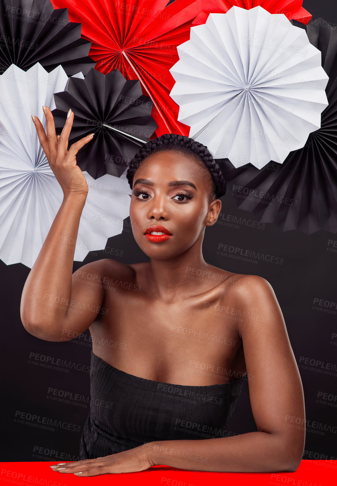 Buy stock photo Portrait, beauty and black woman with origami fans in studio isolated on a dark background. Natural face, makeup cosmetics and skincare of female model with traditional Japanese paper art for culture