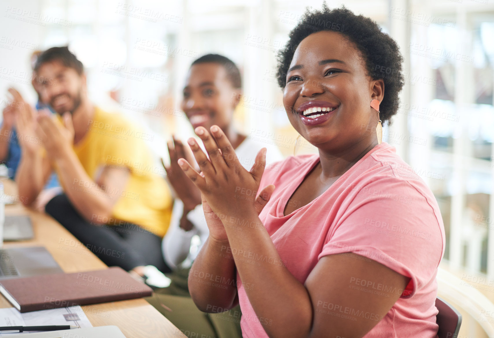 Buy stock photo Shot of a group of businesspeople clapping during a meeting in a modern office