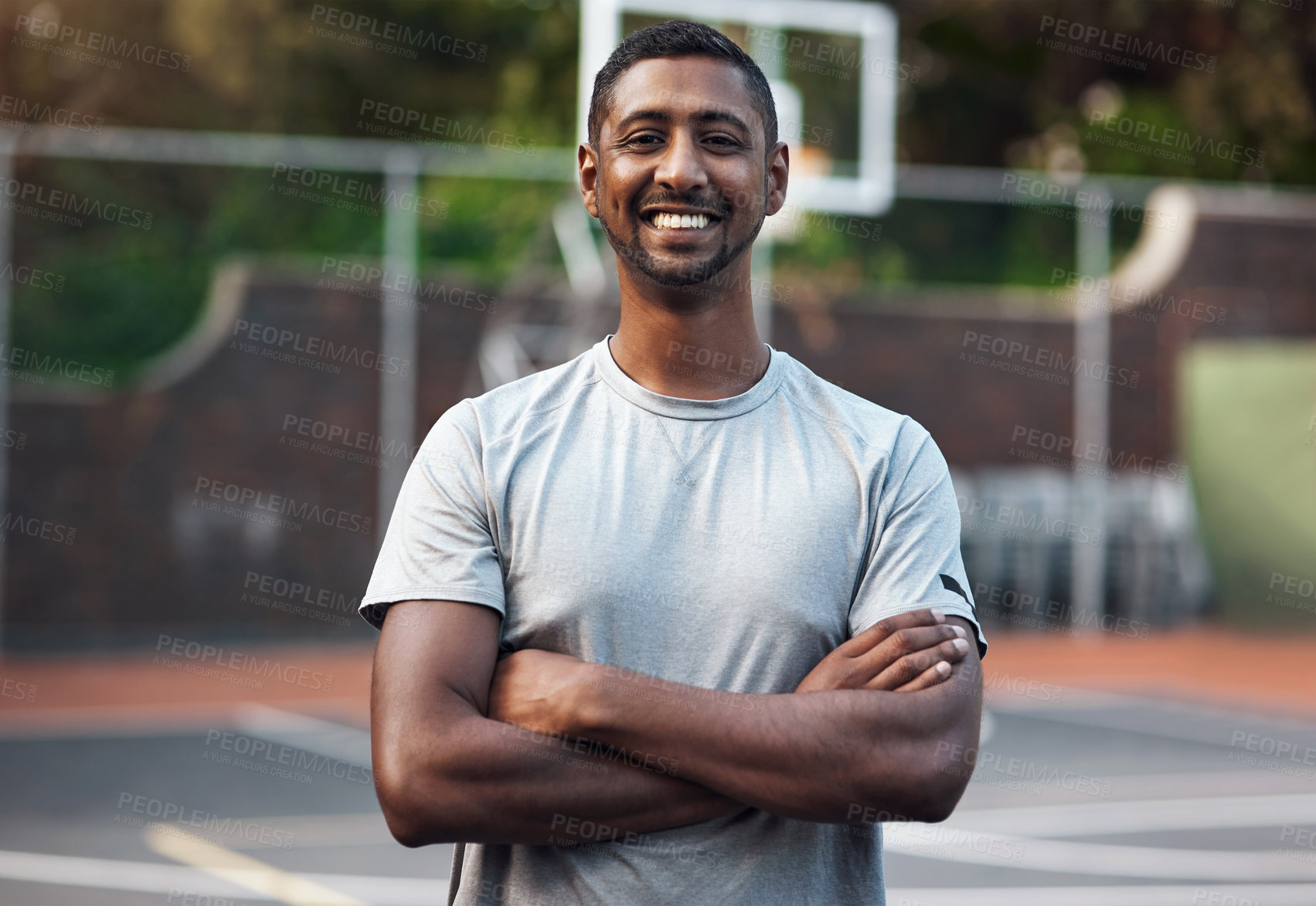 Buy stock photo Portrait of a sporty young man standing on a sports court