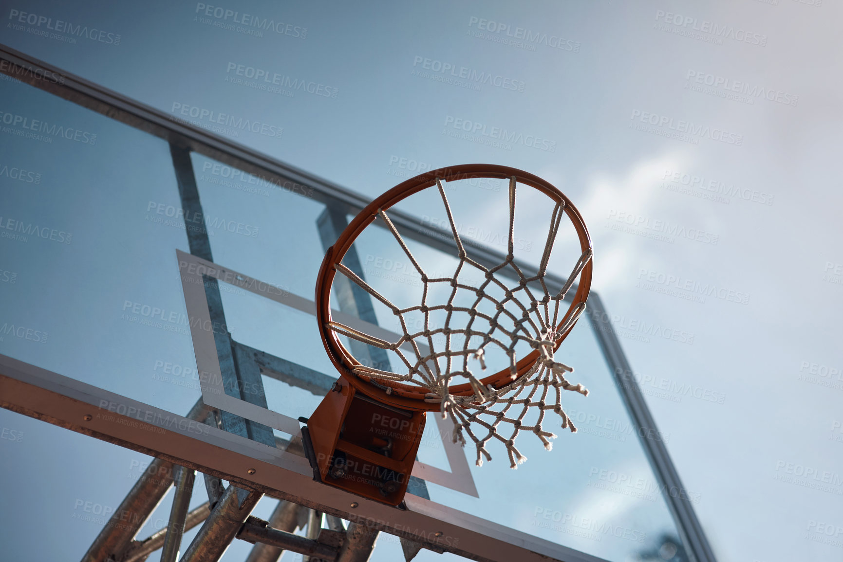 Buy stock photo Closeup shot of a basketball hoop on a sports court