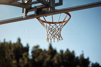 Buy stock photo Closeup shot of a basketball hoop on a sports court