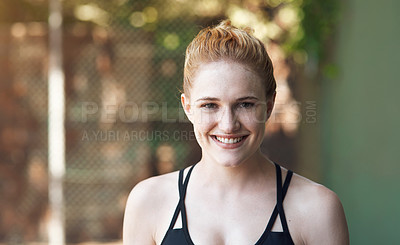 Buy stock photo Cropped portrait of an attractive young female athlete standing on the basketball court