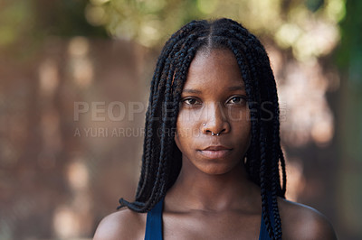 Buy stock photo Cropped portrait of an attractive young female athlete standing on the basketball court