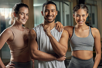 Buy stock photo Cropped portrait of three young athletes standing together in the gym