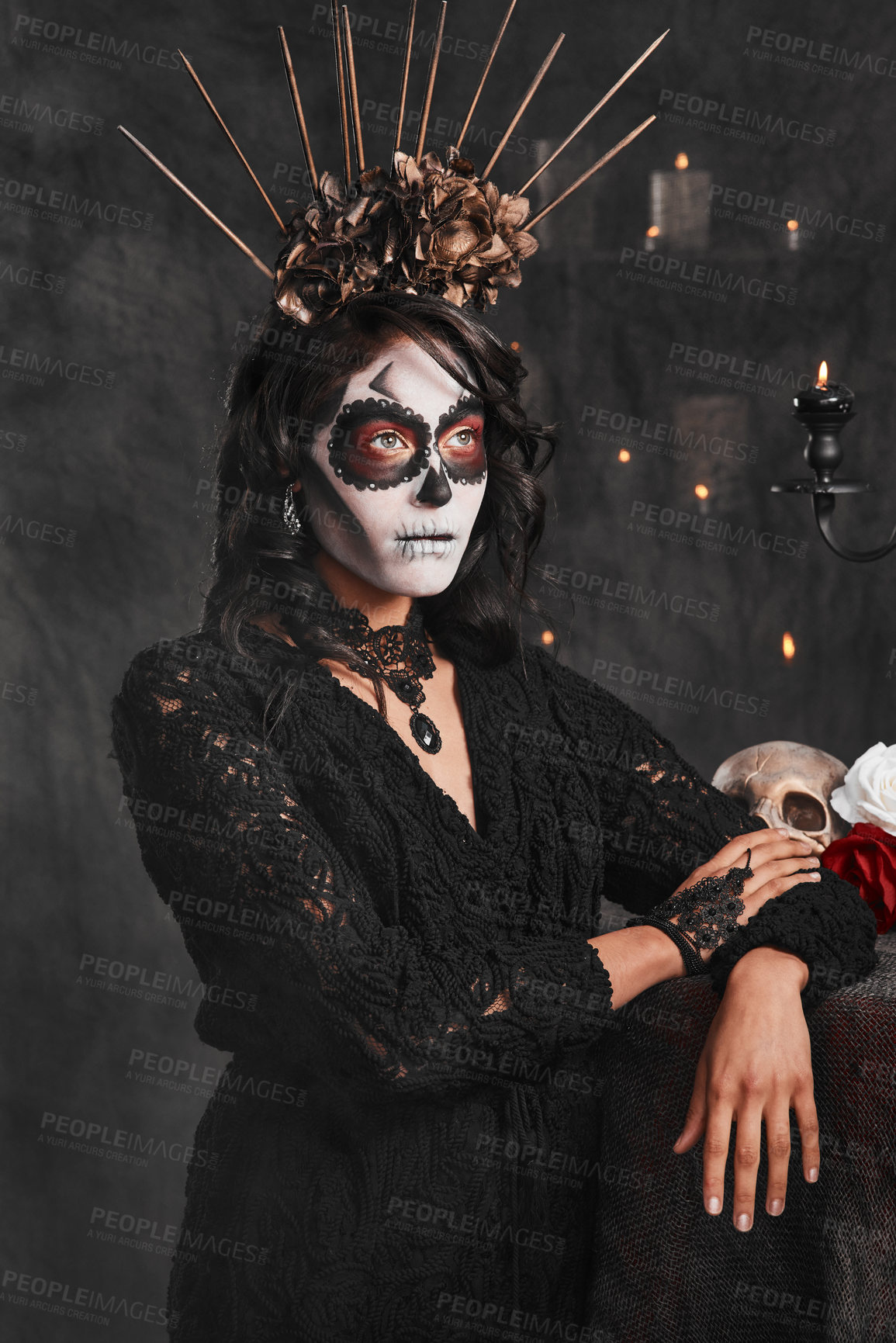 Buy stock photo Cropped shot of an attractive young woman dressed in her Mexican-style halloween costume