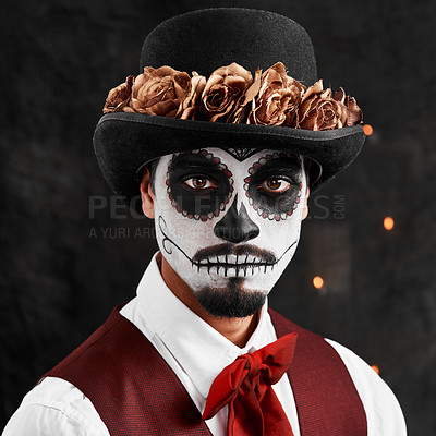 Buy stock photo Cropped portrait of a handsome young man dressed in his Mexican-style halloween costume