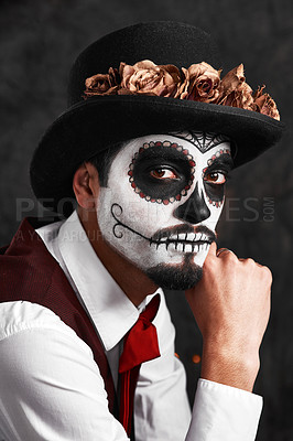Buy stock photo Cropped portrait of a handsome young man dressed in his Mexican-style halloween costume