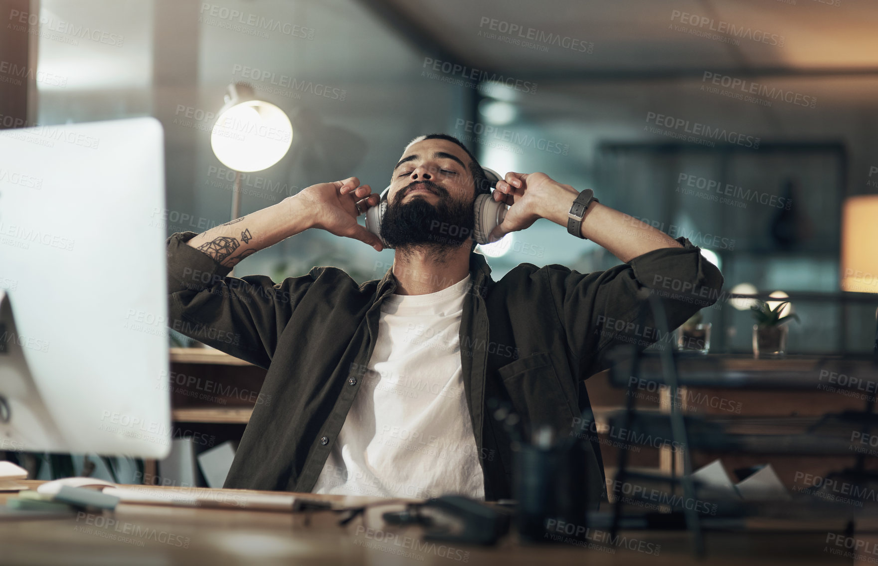 Buy stock photo Headphones, relax and computer with business man in office for sound engineer, production and media. Audio editor, planning and track release with person in creative agency for podcast recording