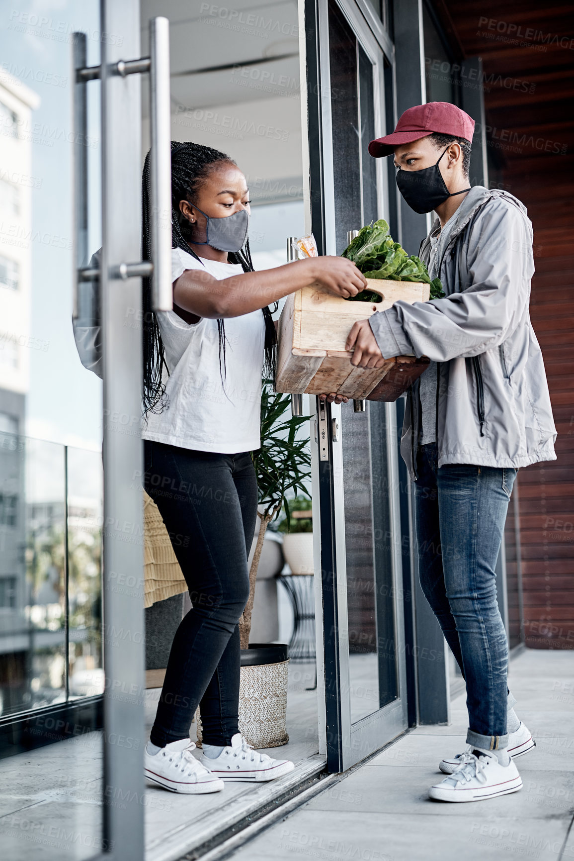 Buy stock photo Delivery, groceries and man with customer at door for online order, convenience and service in quarantine. Face mask, home and person with box of food, vegetables or produce for supermarket ecommerce