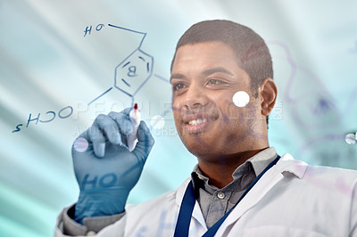Buy stock photo Shot of a young scientist drawing molecular structures on a glass wall in a lab