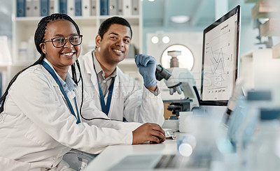 Buy stock photo Portrait of two scientists working together on a computer in a lab