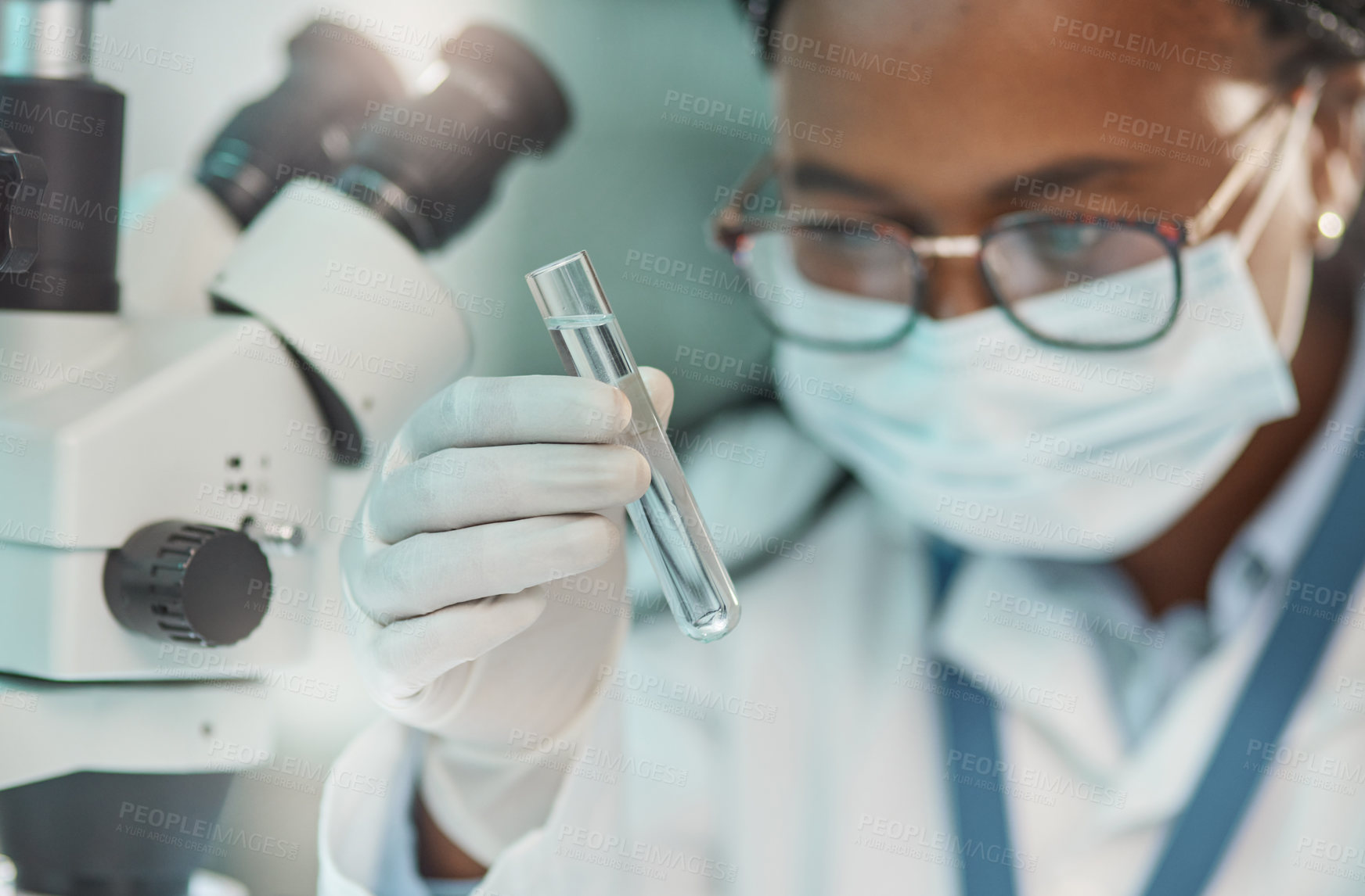 Buy stock photo Shot of a young scientist working with samples in a lab