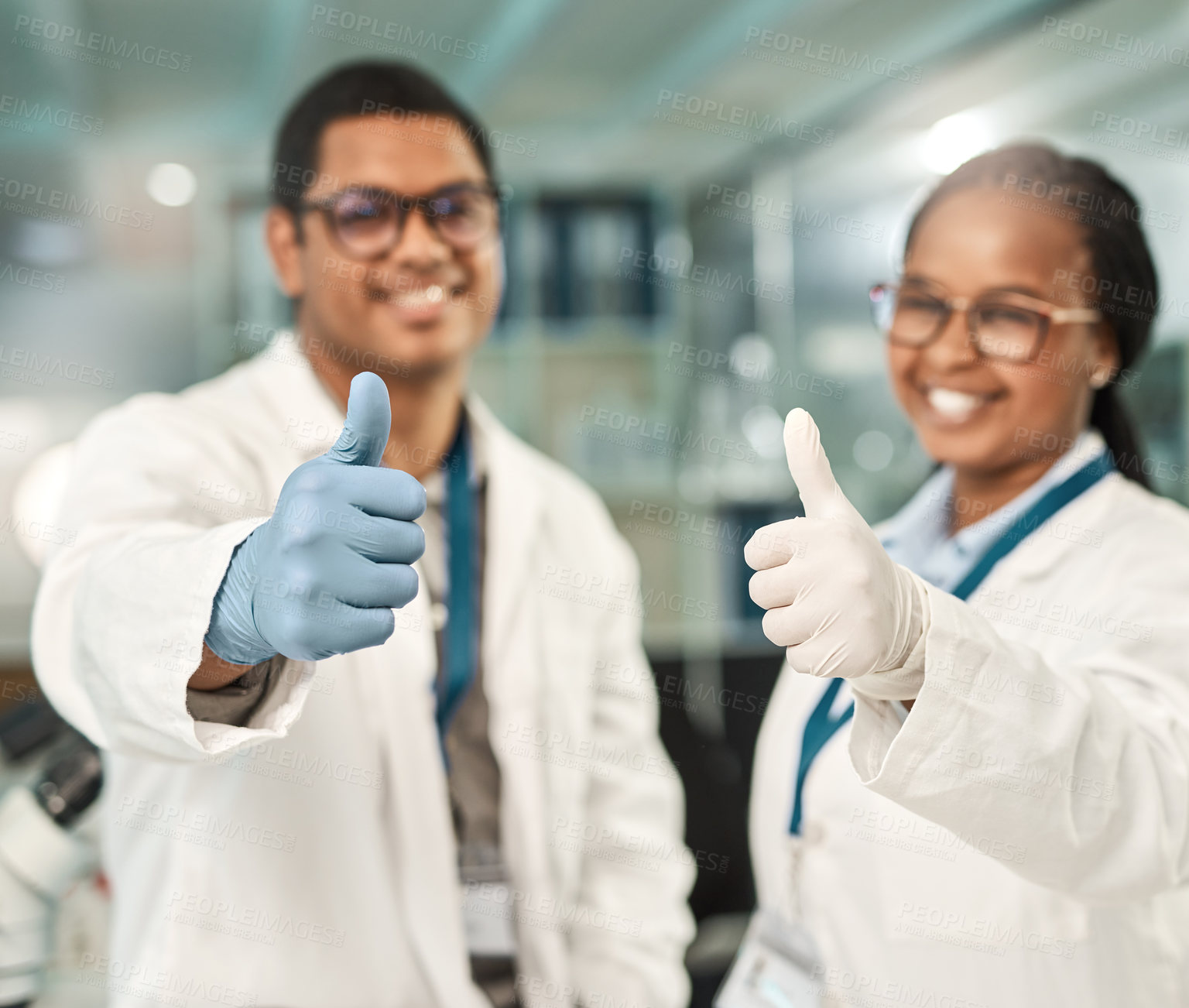 Buy stock photo Shot of two scientists showing thumbs up in a lab
