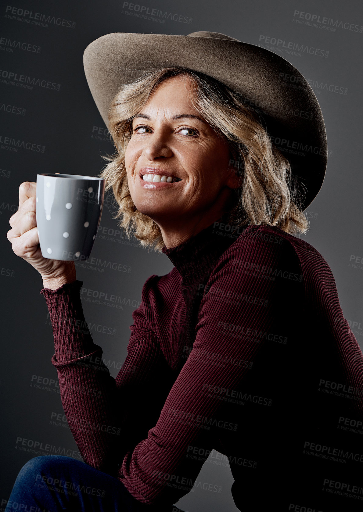 Buy stock photo Cropped shot of a mature woman looking stylish against a grey background