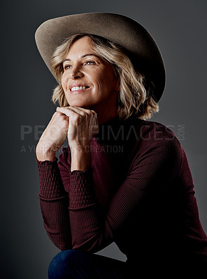 Buy stock photo Cropped shot of a mature woman looking stylish against a grey background