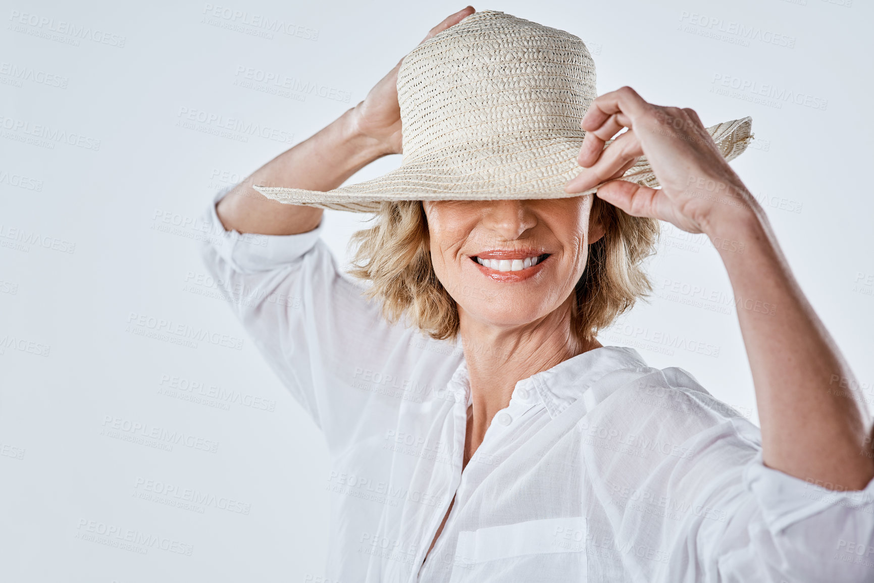 Buy stock photo Cropped shot of a mature woman looking stylish against a white background