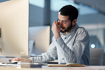 Buy stock photo Call center, man and headache at computer for stress, burnout and problem with client communication at night. Tired telemarketing consultant at desktop with crisis , frustrated and bad sales service