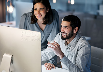 Buy stock photo Call center, manager and happy team at computer for software training, customer service and CRM in office. Man, woman and sales mentor helping intern on desktop, telemarketing and technical support