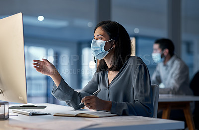 Buy stock photo Call center, woman and mask at computer for customer service, telemarketing notes and CRM consulting at night. Female agent, desktop and virus protection for online support, questions and help desk