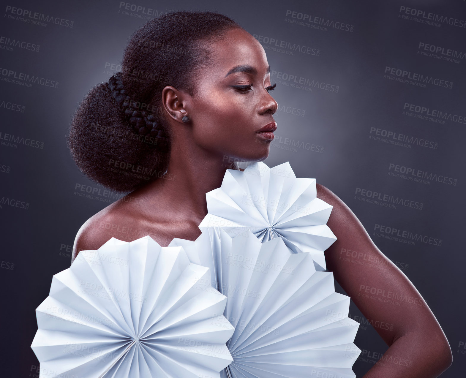 Buy stock photo Black woman, beauty and origami fans in studio, cosmetics and oriental profile on dark background. Female person, skin treatment and confidence for glow, art and foundation shine for dermatology