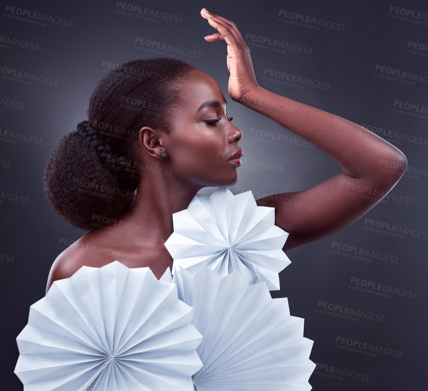Buy stock photo Black woman, cosmetics and origami fans in studio, makeup and oriental profile on dark background. Female person, skin treatment and confidence for glow, beauty and foundation shine for dermatology
