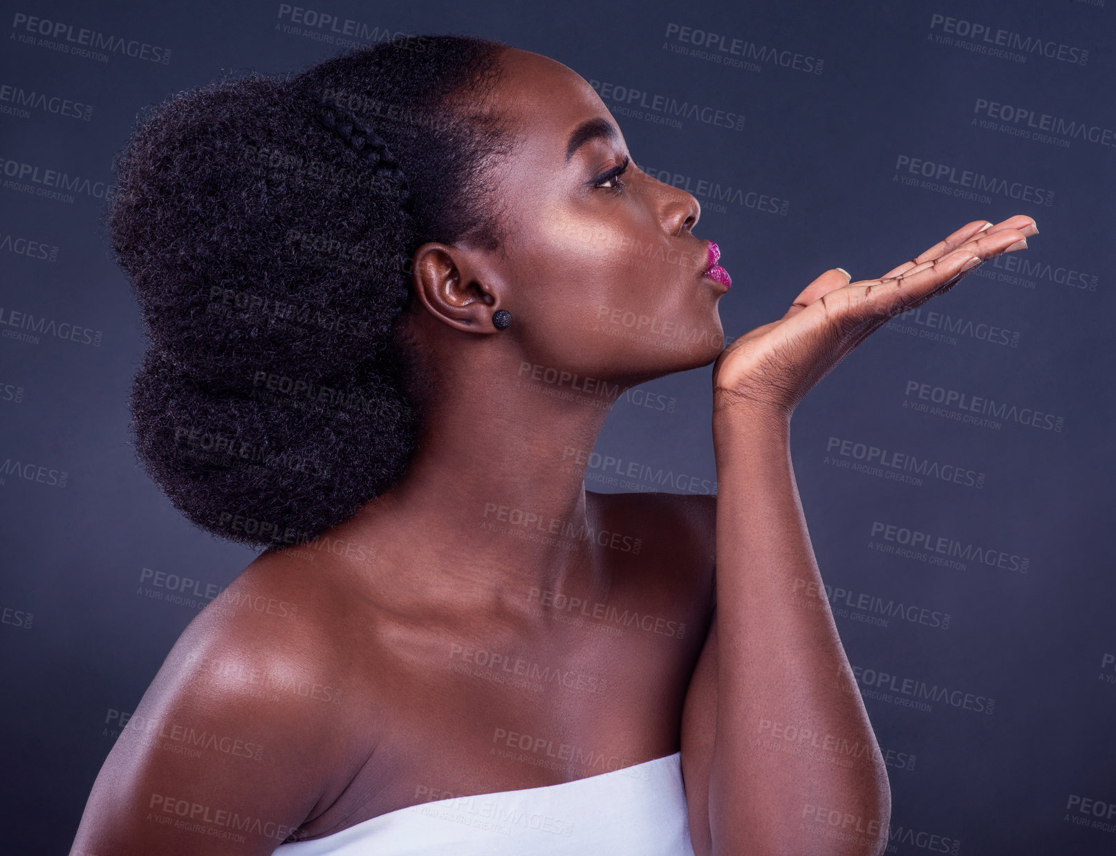 Buy stock photo Black woman, kiss or profile for beauty, skincare, natural makeup and healthy shine isolated in studio. Dermatology, flirt or romantic African model with glow, lipstick or results on dark background