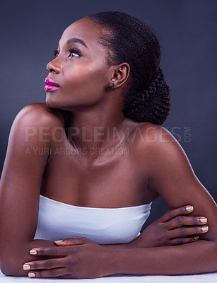 Buy stock photo Black woman, thinking or profile for beauty, skincare, natural makeup or healthy shine isolated in studio. Dermatology ideas, dream and African model with glow, pride or results on dark background