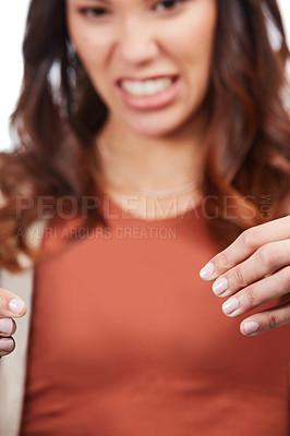 Buy stock photo Shot of a young woman playing with two toy animals in studio