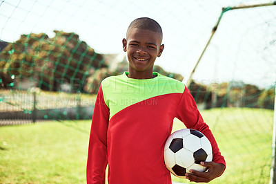 Buy stock photo Portrait of a young boy playing soccer on a sports field