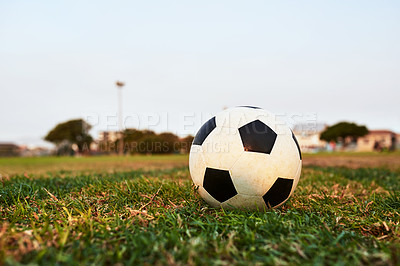 Buy stock photo Closeup shot of a soccer ball on an empty sports field